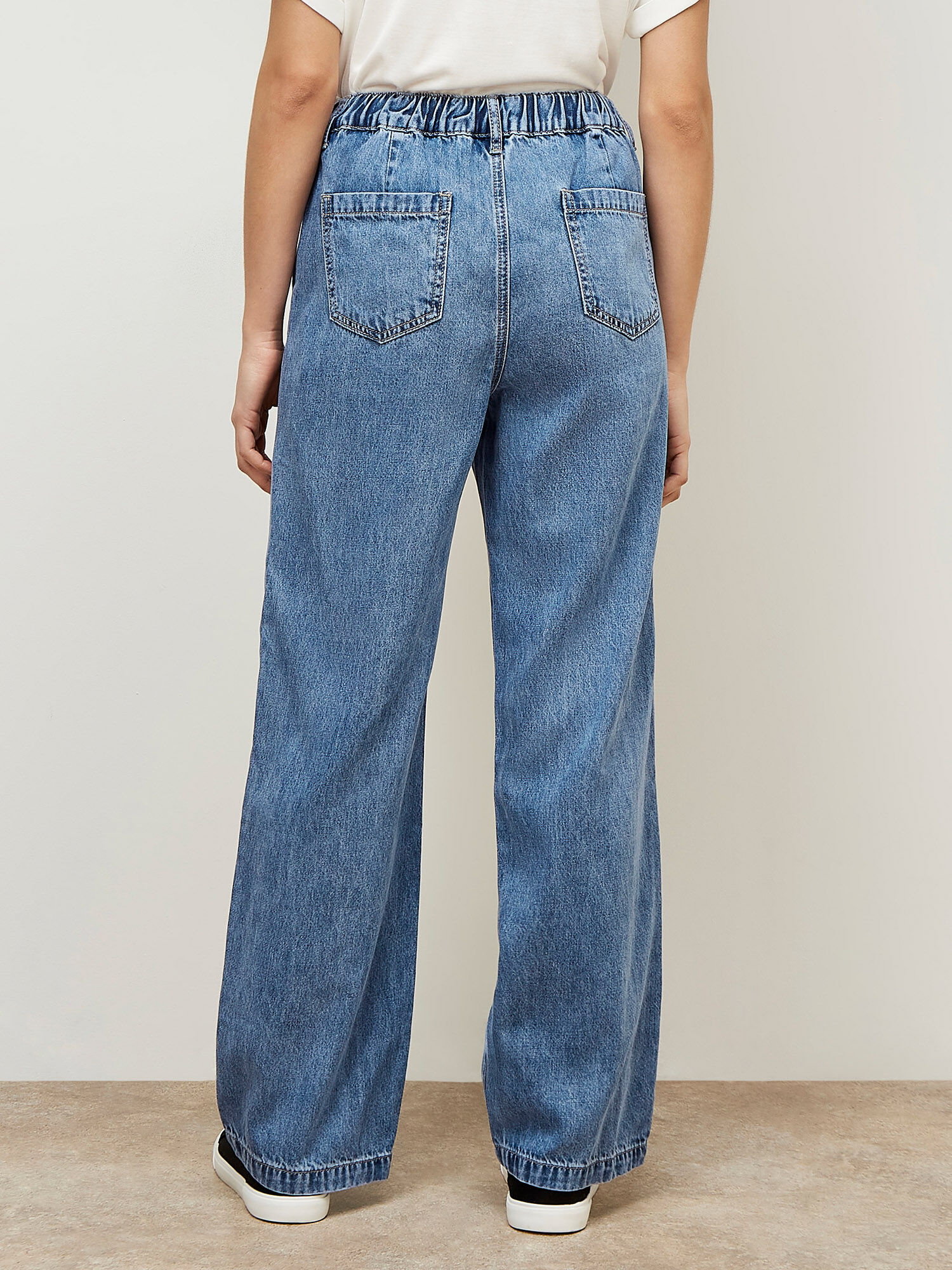 Jean avec cordon de serrage shop