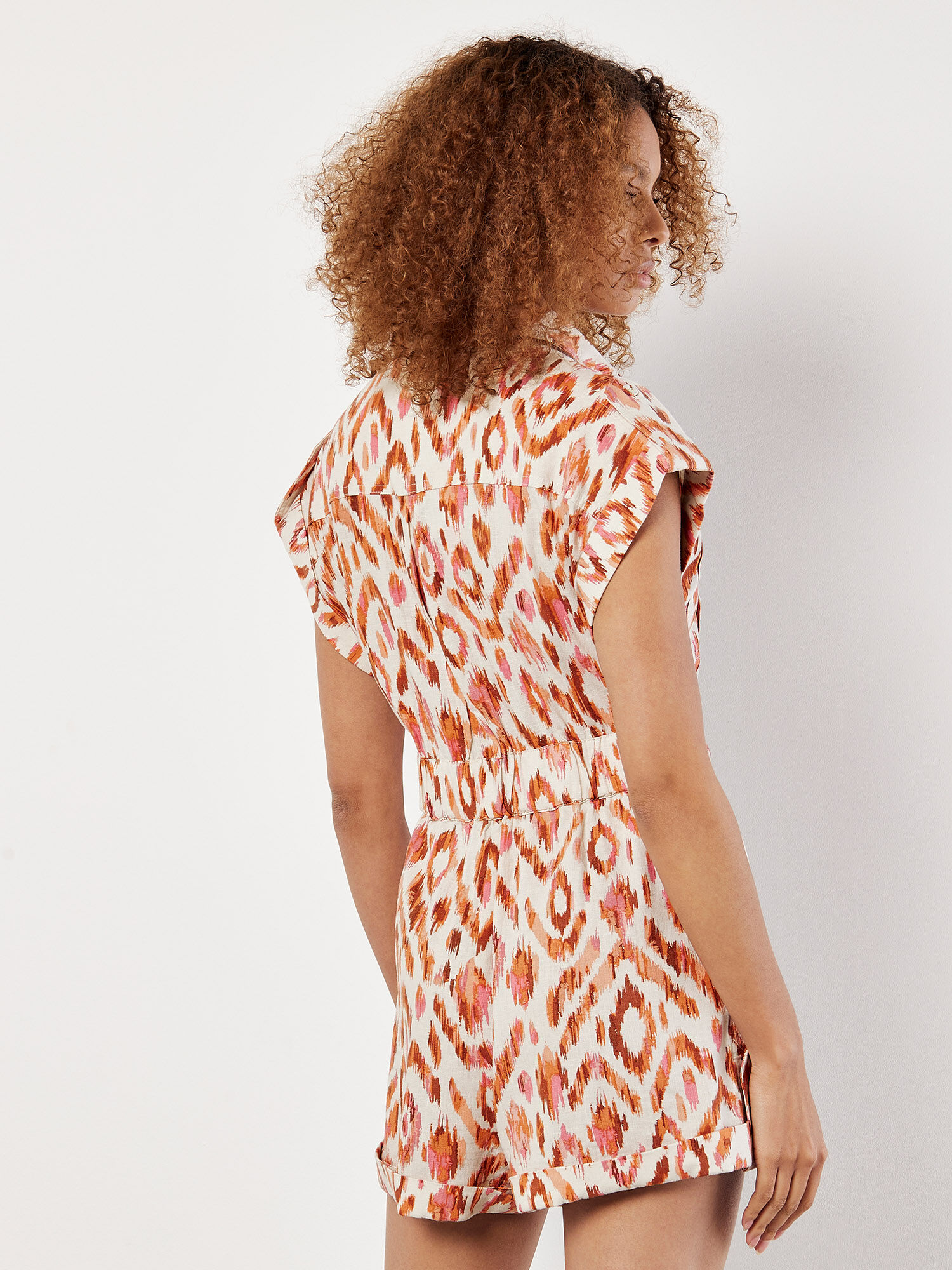 Orange and white jumpsuit hotsell