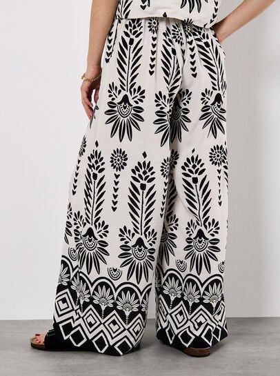 Floral Border Trousers