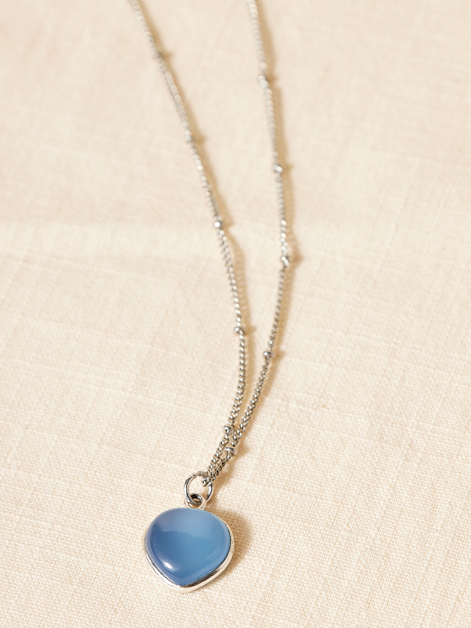 Blue stone heart necklace sales