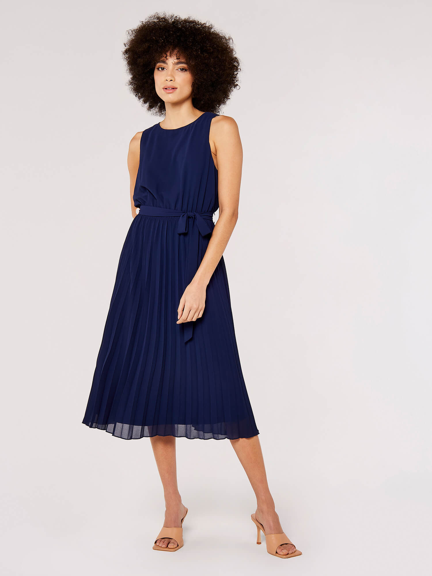 Navy dress store with pleated skirt