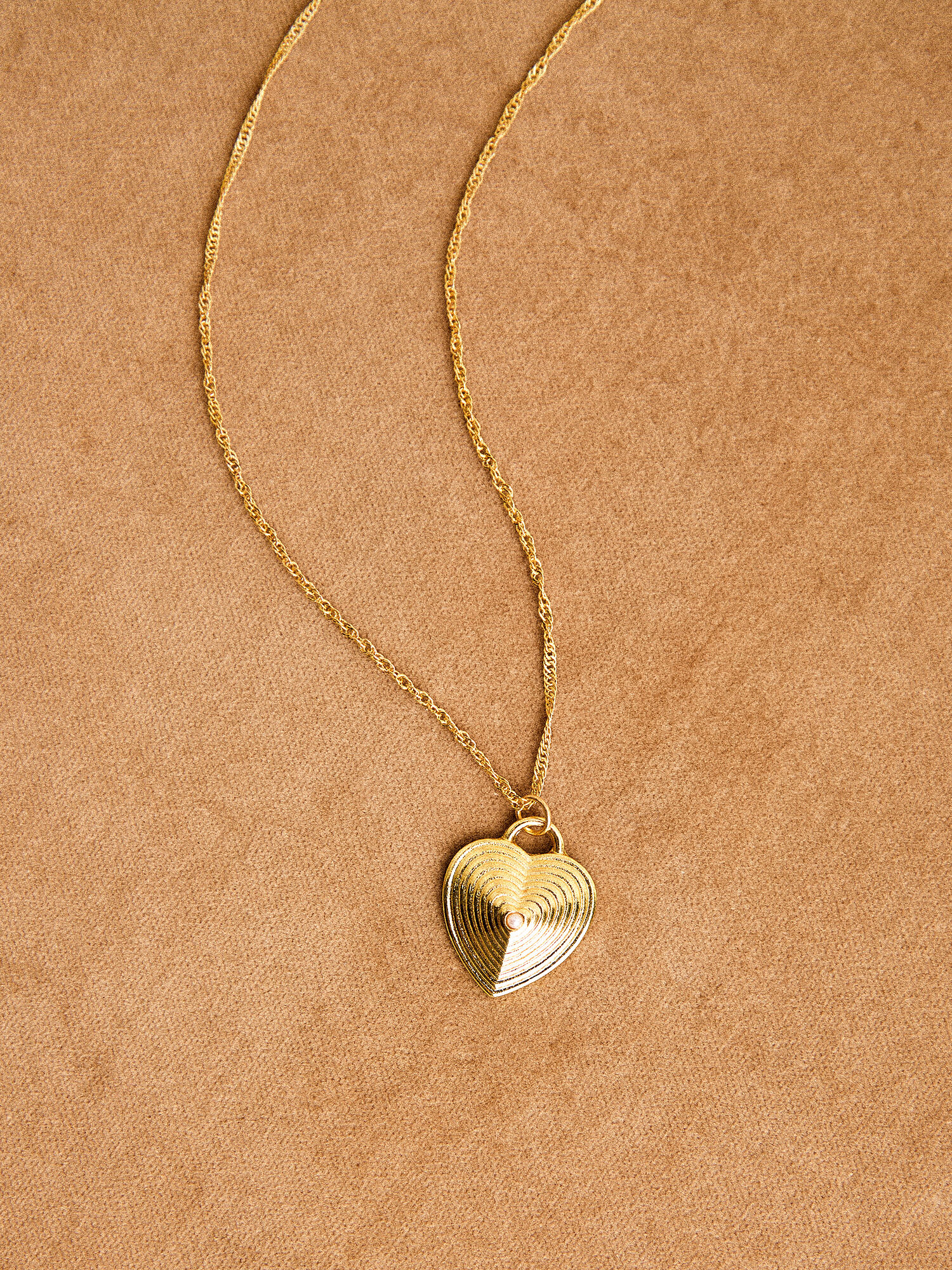 Plain gold heart locket on sale