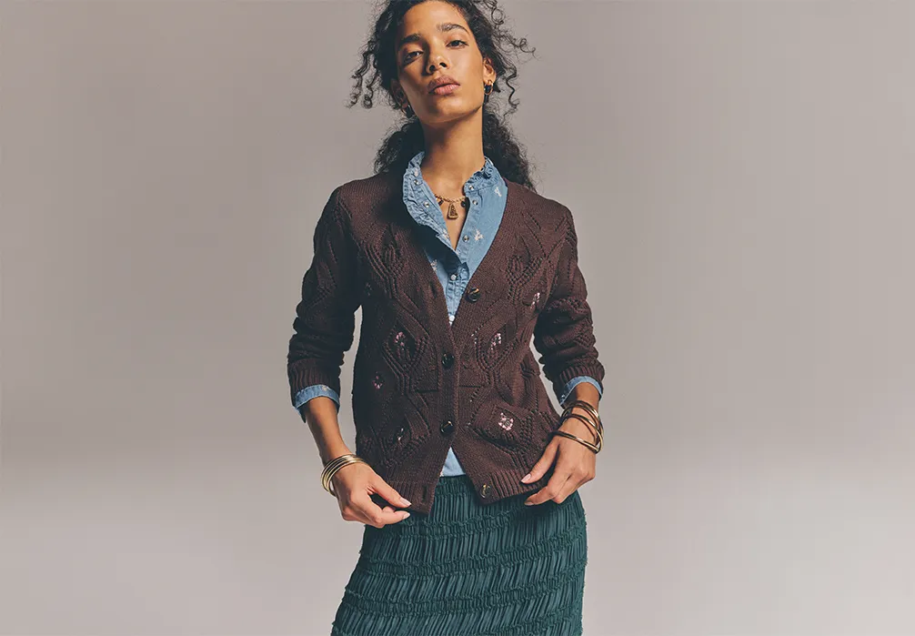 Studio shot of a model wearing the Pointelle Diamond floral cotton-blend cardigan