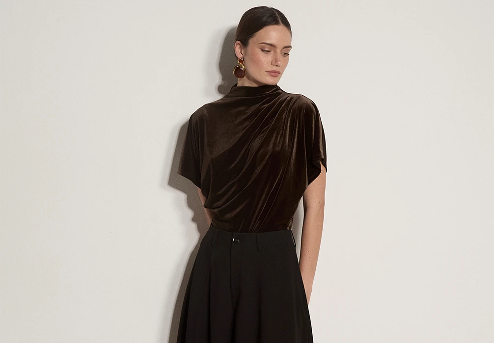 Model wearing a brown velvet batwing t-shirt