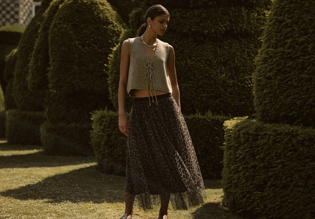 Shop mini, midi, and maxi skirts designed to elevate your everyday wardrobe. From satin and leather to denim and tulle, discover printed, pleated, and sequin-embellished skirts.