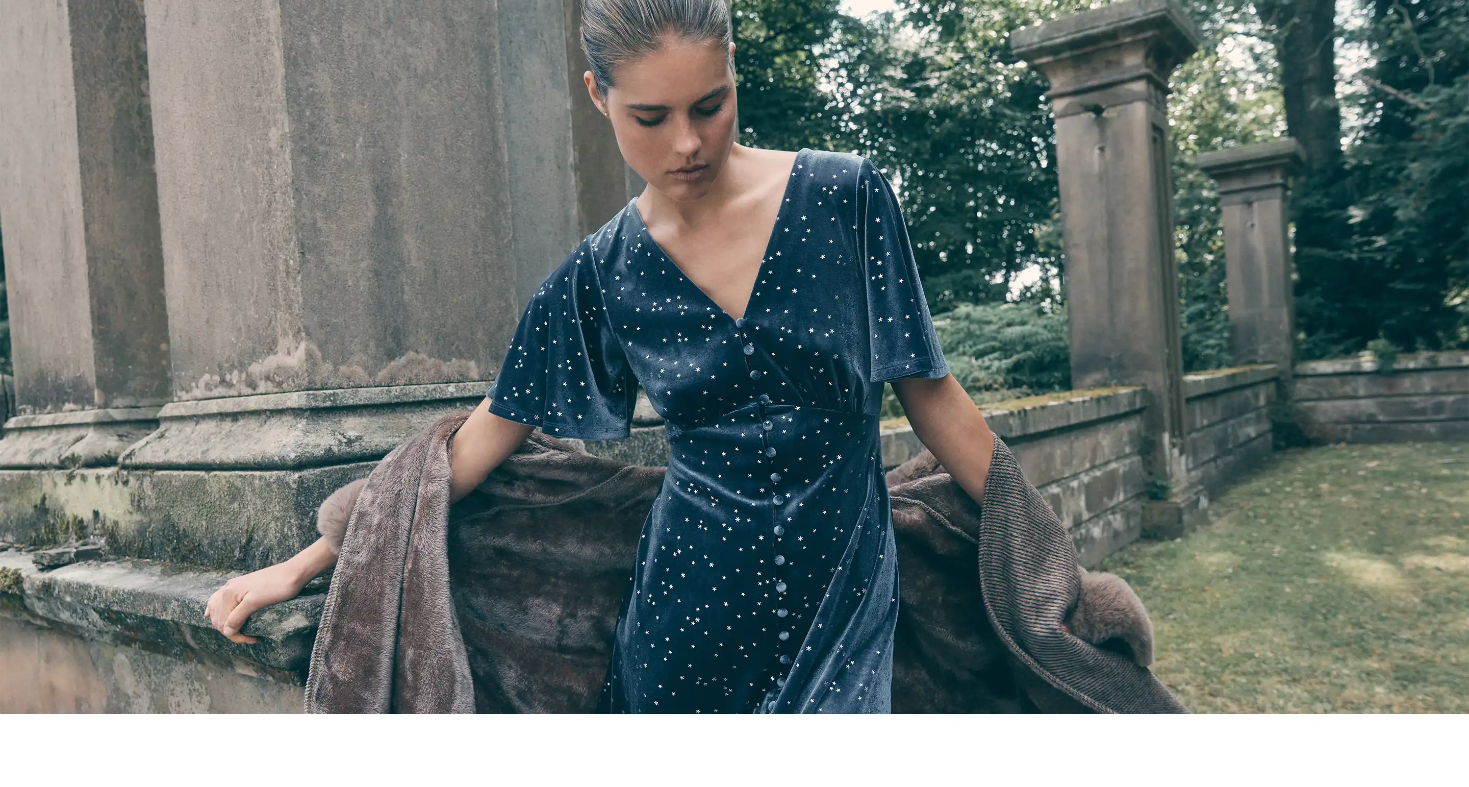 Model wearing satin party dress