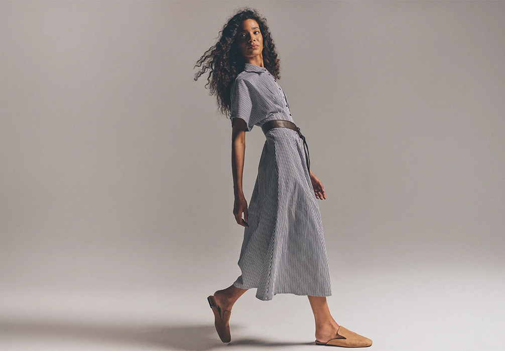 2 models wearing a blue and white striped shirt dresses