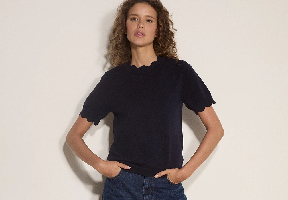 Model wearing the Scallop Knit T-shirt