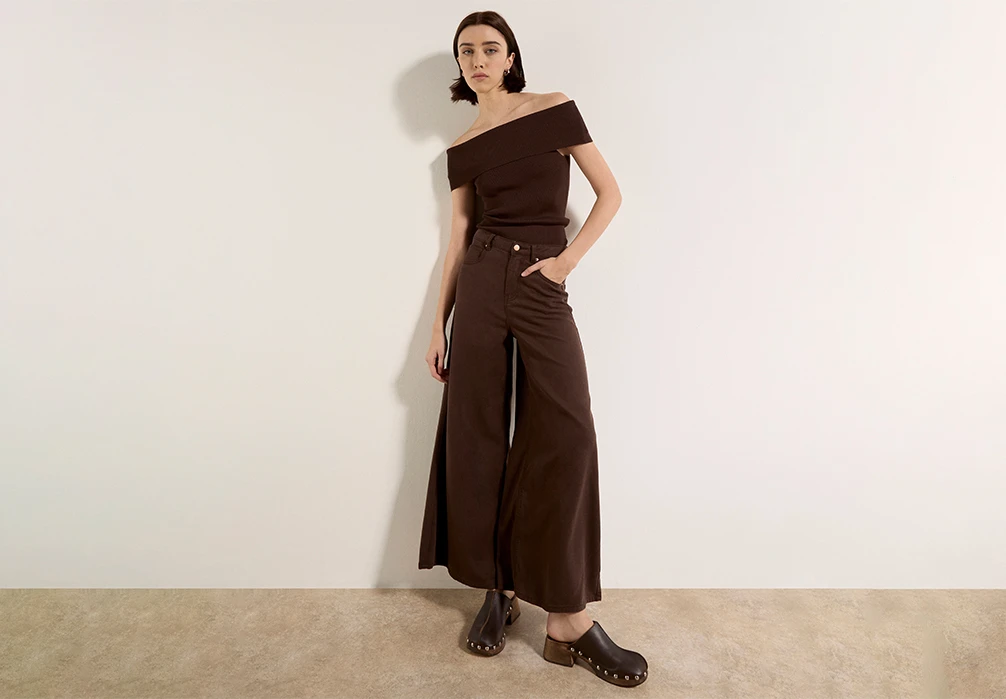 model wearing the Pinstripe Linen Blend Wide-Leg Trousers